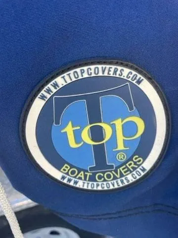 Slide: The Image of Top Boat Covers logo on Tidewater 232 SS, 2023 model. - 17