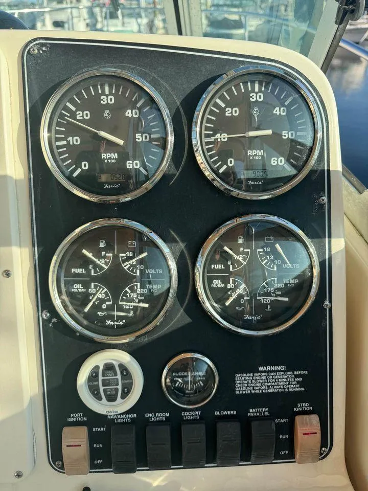 Slide: The Image of Dashboard of a 2001 Pursuit 3000 Express boat with gauges and controls. - 8