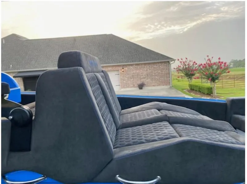 Slide: The Image of Luxurious seating on 2021 Statement 380 Open boat, with a scenic background. - 15