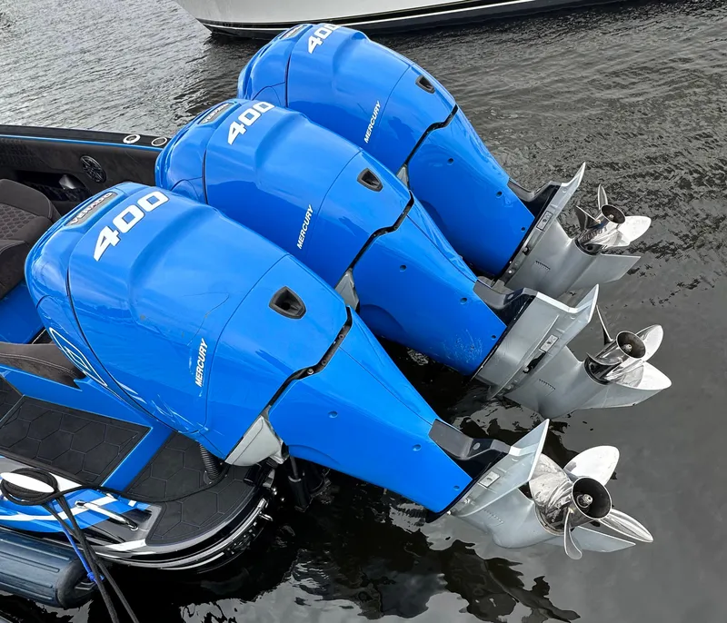 Slide: The Image of Triple Mercury 400 outboard engines on a 2021 Statement 380 Open boat. - 17