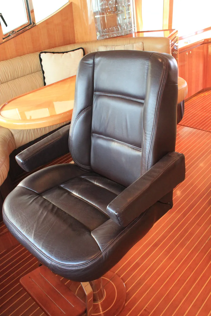 Slide: The Image of Luxurious leather chair in 2004 Horizon P70 yacht interior. - 24