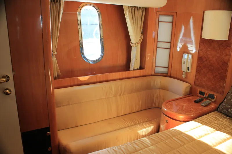 Slide: The Image of Luxurious cabin interior of 2004 Horizon P70 yacht with elegant wood finish. - 34