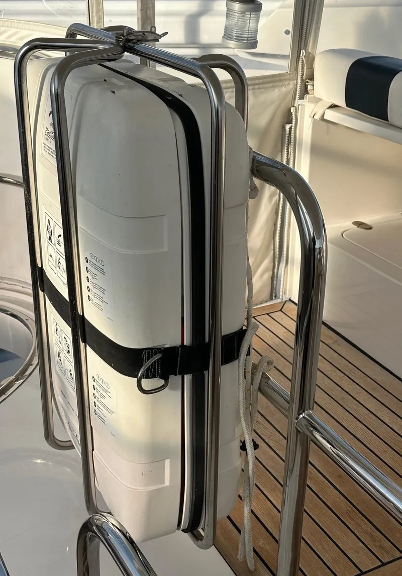 Slide: The Image of Liferaft secured on Horizon P70 yacht, 2004 model, with stainless steel railing. - 45