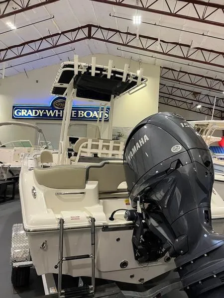 Slide: The Image of 2025 Key West 203 FS boat with Yamaha engine in showroom. - 4