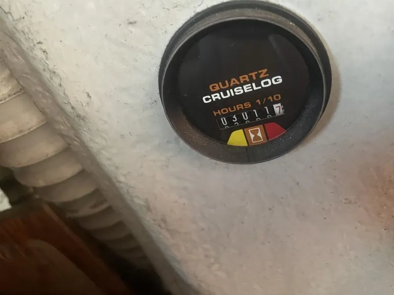 Slide: The Image of Quartz Cruiselog hour meter on 1987 Rampage 31 Express boat. - 12