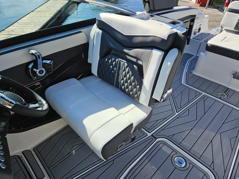 Slide: The Image of 2025 Monterey 255SS boat interior with luxurious seating and modern design. - 22