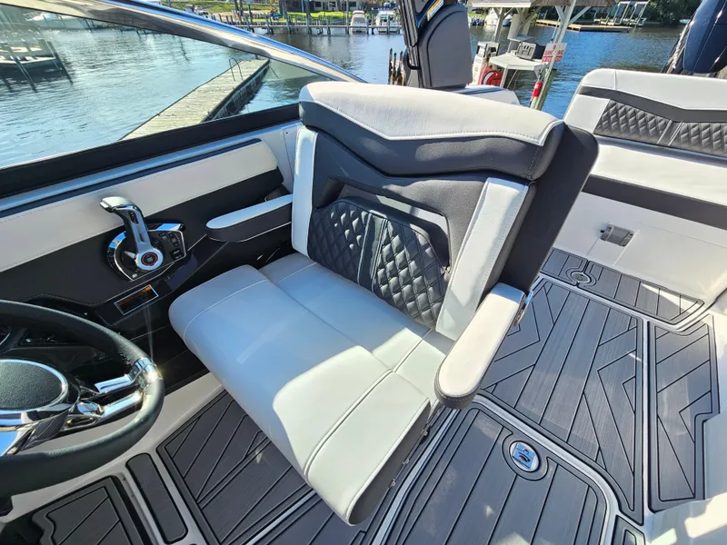 Slide: The Image of 2025 Monterey 255SS boat interior with modern seating and sleek design. - 30