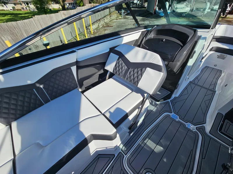 Slide: The Image of 2025 Monterey 255SS boat interior with stylish seating and modern design. - 32
