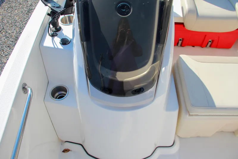 Slide: The Image of 2022 Boston Whaler 160 Super Sport boat interior with console and seating. - 16