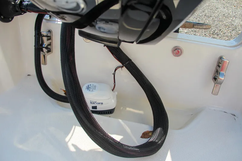 Slide: The Image of 2022 Boston Whaler 160 Super Sport interior wiring and components. - 20