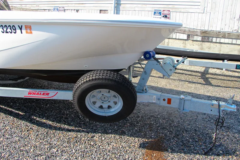 Slide: The Image of 2022 Boston Whaler 160 Super Sport on trailer, side view. - 6