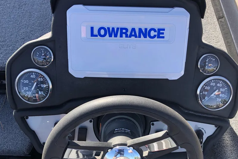 Slide: The Image of 2023 Ranger RT188P dashboard with Lowrance Elite display and gauges. - 11