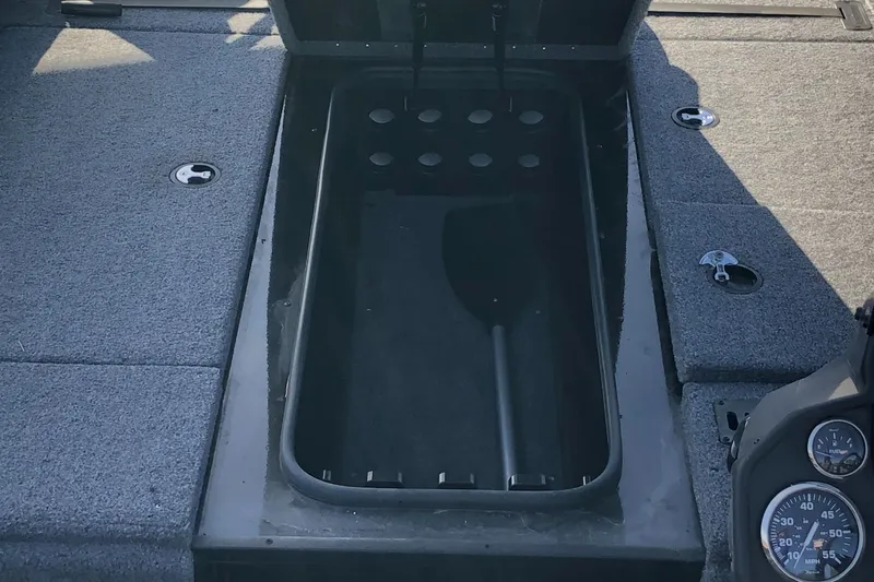 Slide: The Image of 2023 Ranger RT188P boat storage compartment with paddle inside. - 5