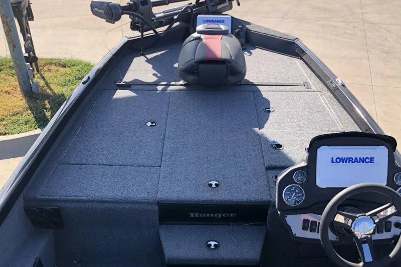 Slide: The Image of 2023 Ranger RT188P boat interior with Lowrance electronics and steering wheel. - 9