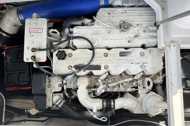 Slide: The Image of Engine of a 2006 Glacier Bay 3470 Ocean Runner boat, featuring Cummins components. - 23