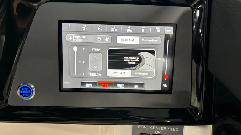 Slide: The Image of 2025 MasterCraft NXT23 touchscreen control panel displaying boat settings. - 21