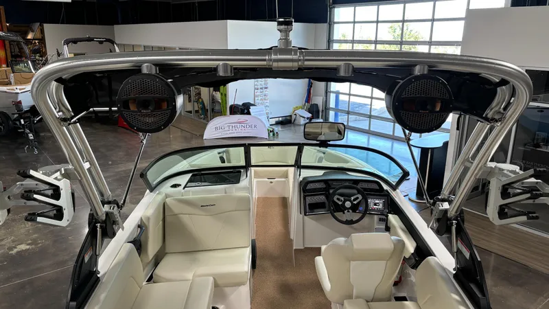 Slide: The Image of 2025 MasterCraft NXT23 boat interior with sleek design and advanced features. - 27