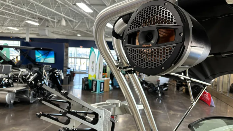 Slide: The Image of 2025 MasterCraft NXT23 boat with Klipsch speaker in showroom. - 29