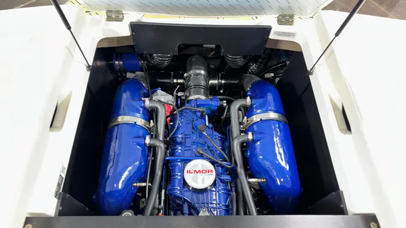 Slide: The Image of 2025 MasterCraft NXT23 engine with blue Ilmor components. - 41