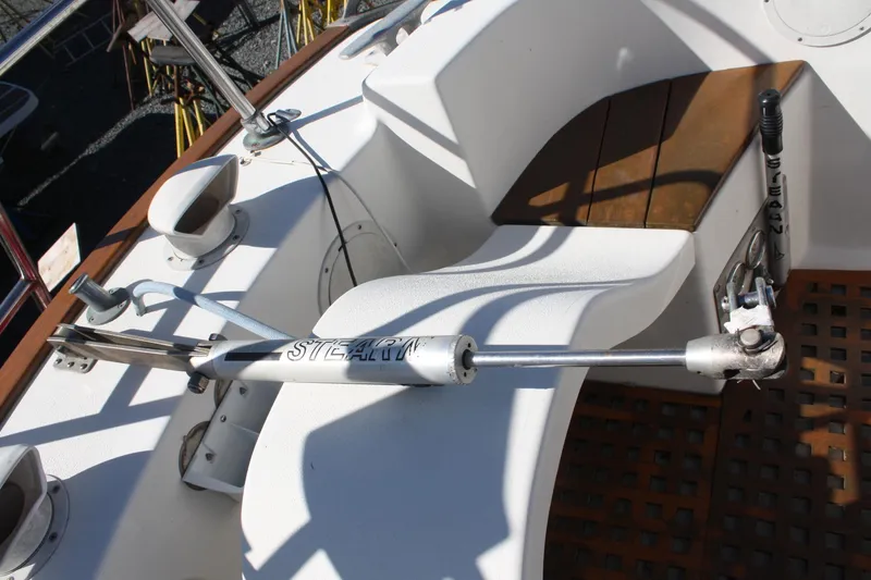 Slide: The Image of Cockpit of a 1976 C&C 38 sailboat featuring a steering mechanism. - 20