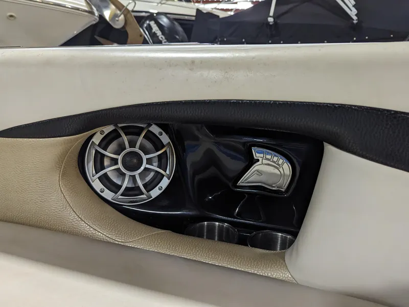 Slide: The Image of Centurion Enzo SV233 2014 boat interior with speaker and cup holders. - 18