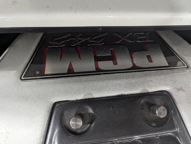 Slide: The Image of Close-up of a 2014 Centurion Enzo SV233 boat detail with logo and hardware. - 27