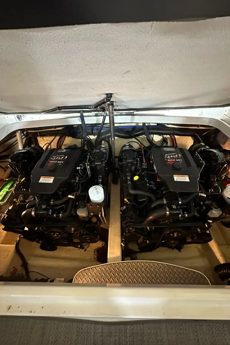 Slide: The Image of Twin engines in a 2007 Formula 310 Sun Sport boat. - 19