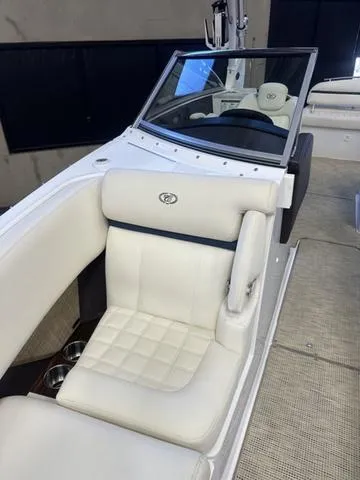 Slide: The Image of 2020 Cobalt R7 Surf boat with luxurious white seating and modern design. - 15