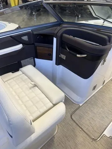 Slide: The Image of 2020 Cobalt R7 Surf boat interior with white seating and sleek design. - 18