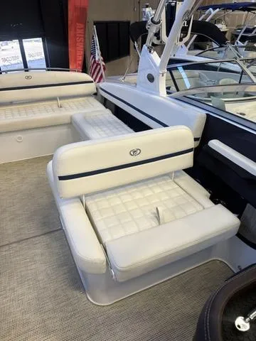 Slide: The Image of 2020 Cobalt R7 Surf boat interior with white cushioned seating. - 19