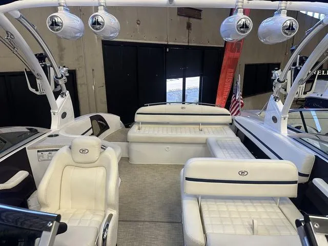 Slide: The Image of 2020 Cobalt R7 Surf boat interior with white leather seating and modern design. - 21