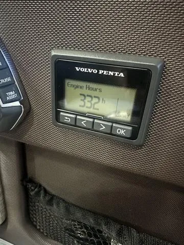 Slide: The Image of Volvo Penta engine hour meter displaying 332 hours on a 2020 Cobalt R7 Surf. - 22