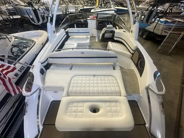 Slide: The Image of 2020 Cobalt R7 Surf boat with luxurious white seating and spacious interior. - 7