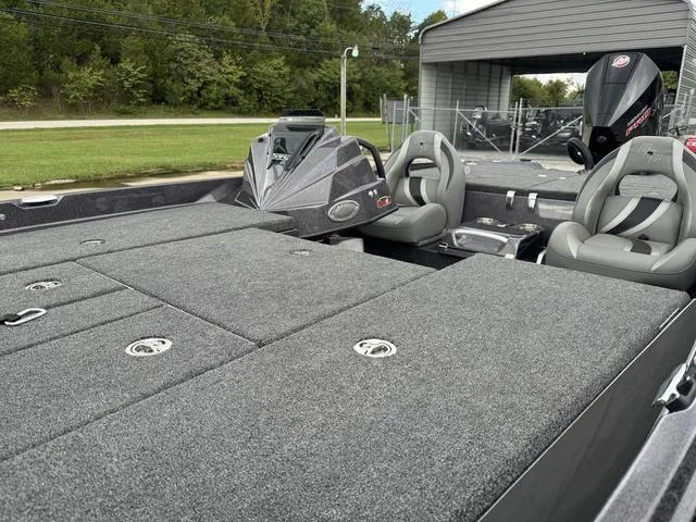 Slide: The Image of 2025 Bass Cat Puma STS fishing boat with spacious deck and comfortable seating. - 9