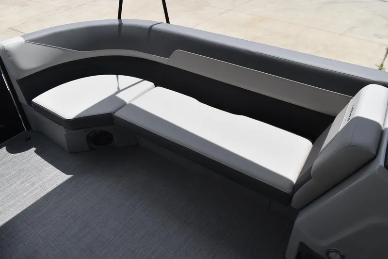 Slide: The Image of Luxurious seating on 2025 Lowe LS210WT TL boat, featuring sleek gray upholstery. - 14