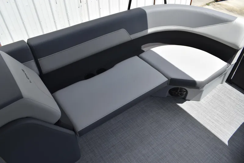 Slide: The Image of Luxurious seating on 2025 Lowe LS210WT TL boat, featuring sleek gray upholstery. - 19
