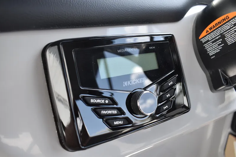Slide: The Image of Kicker media center in 2025 Lowe LS210WT TL boat dashboard. - 27