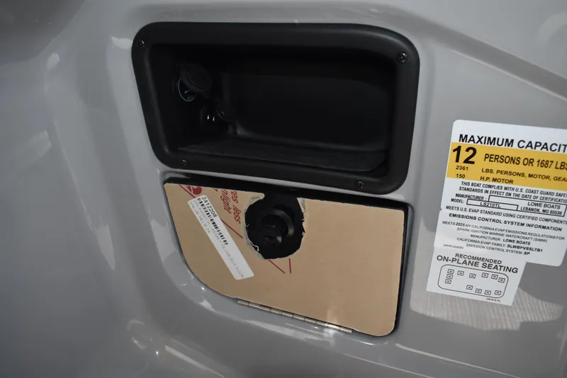 Slide: The Image of Control panel and capacity label on 2025 Lowe LS210WT TL boat. - 31