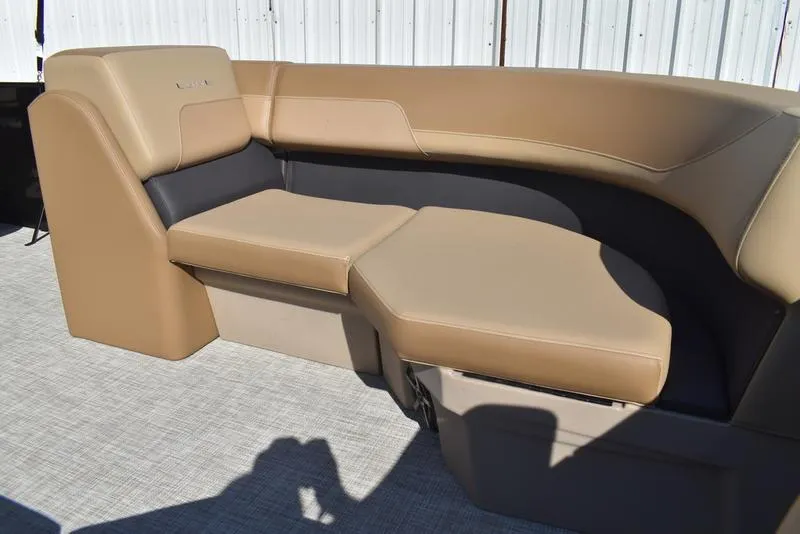 Slide: The Image of Lowe LS190 2025 boat seating with tan and black upholstery. - 12