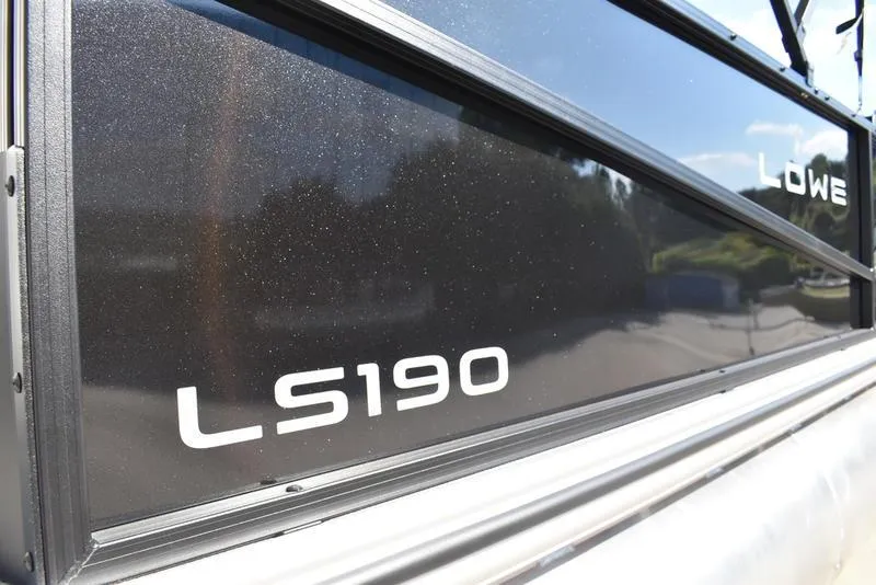 Slide: The Image of 2025 Lowe LS190 boat side view with sleek black finish. - 4