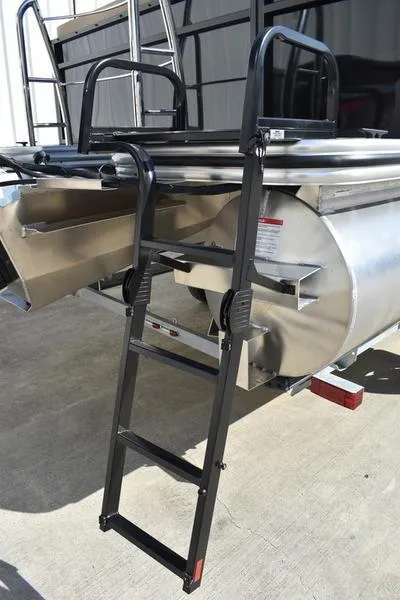 Slide: The Image of Lowe LS190 2025 boat with a black boarding ladder on a concrete surface. - 8