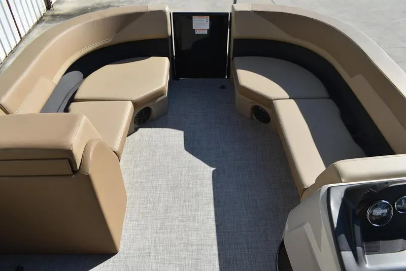 Slide: The Image of 2025 Lowe LS190 boat interior with beige seating and modern design. - 9
