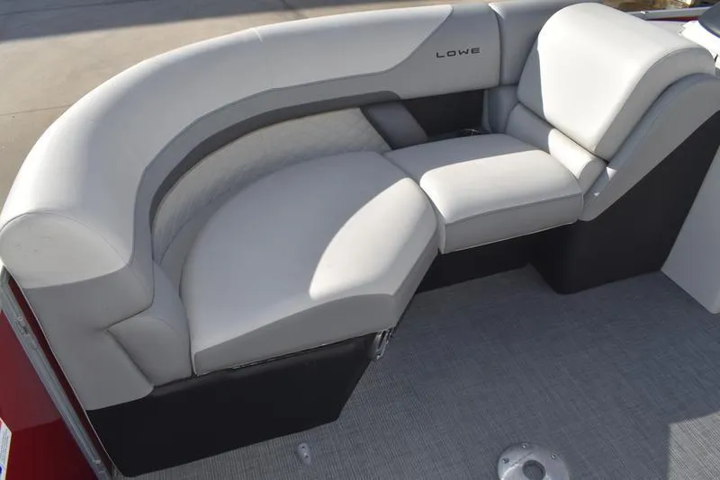 Slide: The Image of 2023 Lowe SS 210 DL boat seat with open storage compartment. - 13