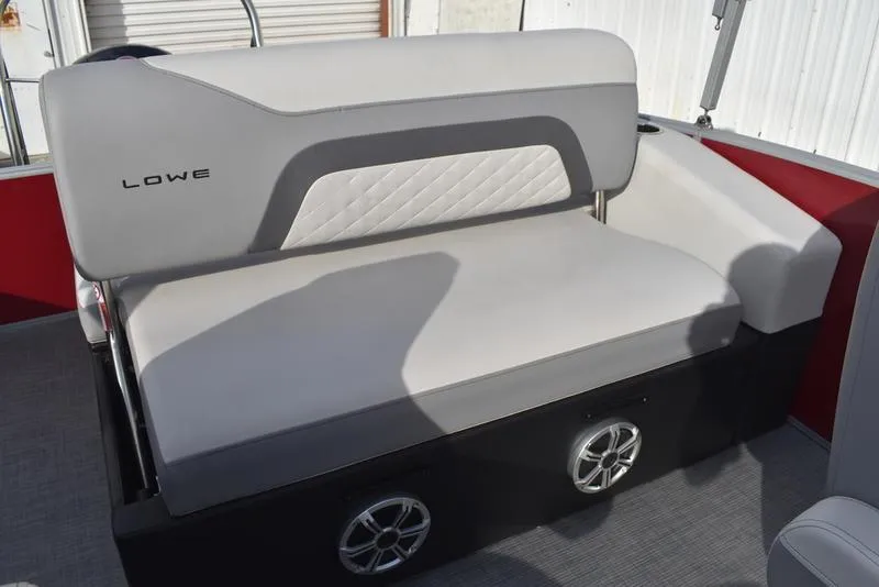 Slide: The Image of 2023 Lowe SS 210 DL boat seat with gray upholstery and built-in speakers. - 34