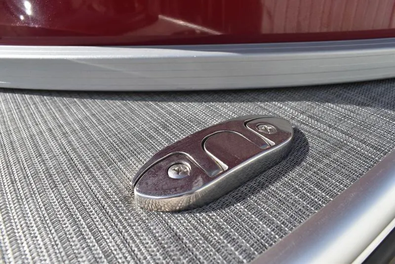 Slide: The Image of 2023 Lowe SS 210 DL boat detail with stainless steel cleat on textured surface. - 5