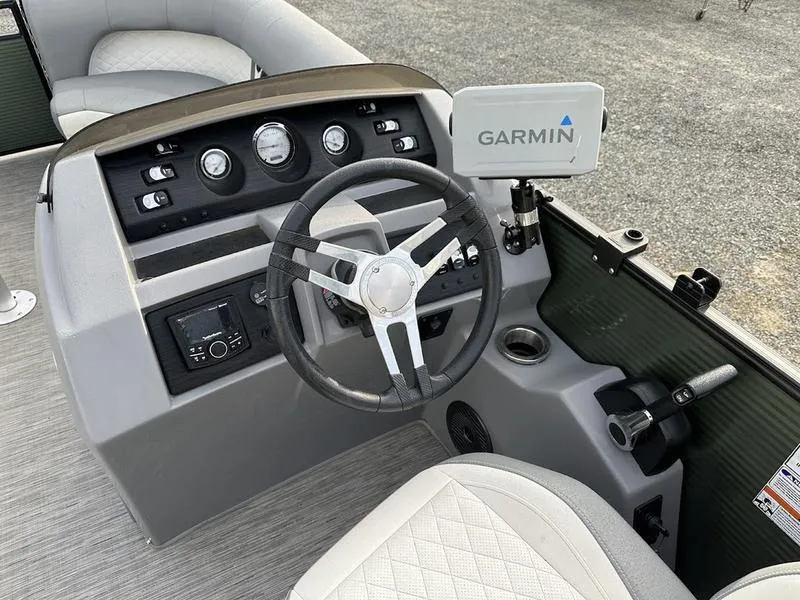 Slide: The Image of 2021 Bennington 22 LFB boat dashboard with Garmin navigation system. - 11