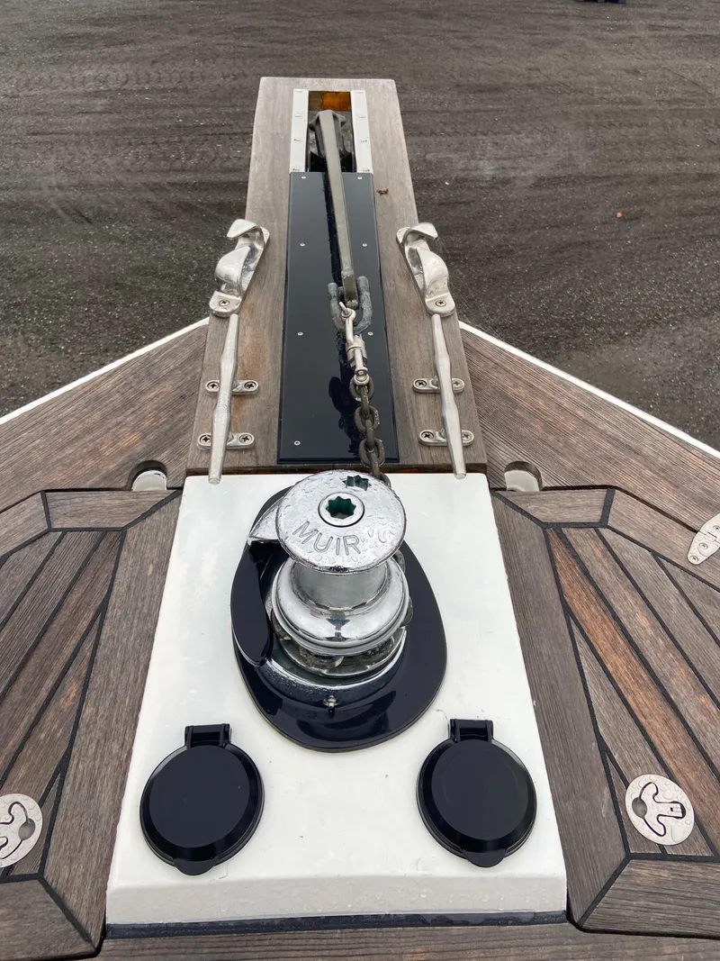 Slide: The Image of 2011 Sabre Custom Yachtfish anchor system with polished winch and wooden deck. - 14