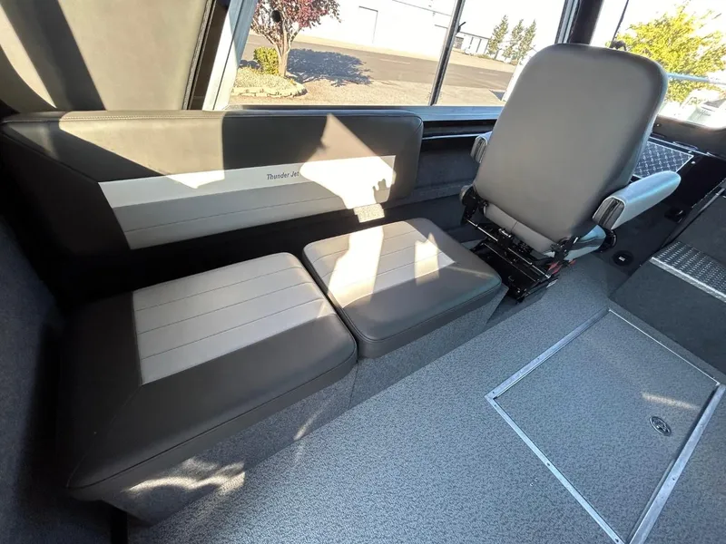 Slide: The Image of Interior seating of 2025 Thunder Jet Alexis Pro XL 26' boat, featuring modern design and comfort. - 15