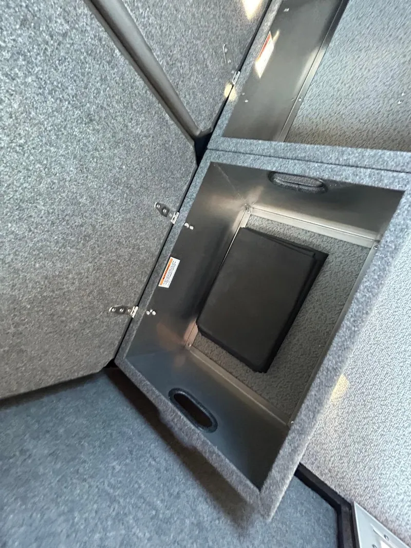 Slide: The Image of Open storage compartment in 2025 Thunder Jet Alexis Pro XL 26' boat. - 22