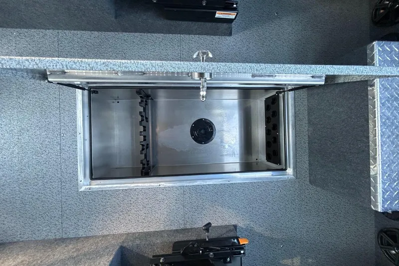 Slide: The Image of Open storage compartment in 2025 Thunder Jet Alexis Pro XL 26' boat. - 37